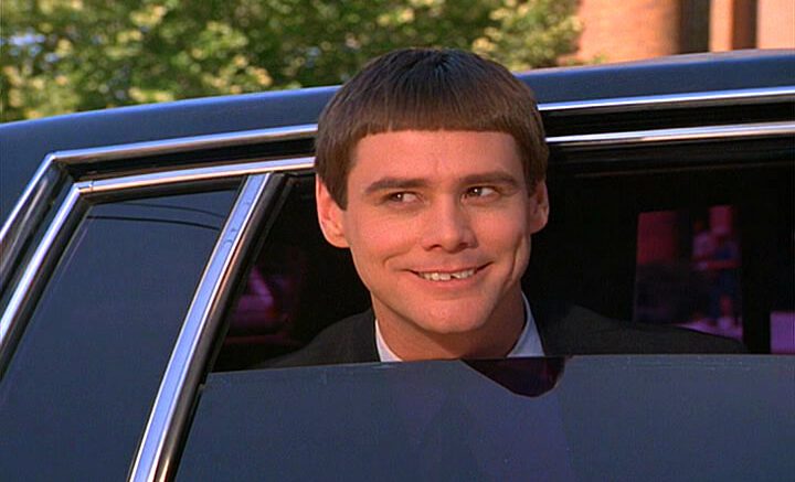 Jim Carrey nel film Scemo più Scemo